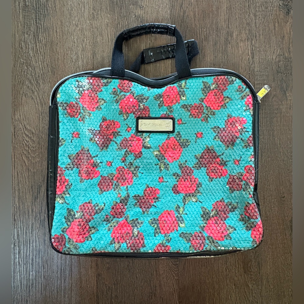 Betsey John turquoise and floral fully clear sequined bag.